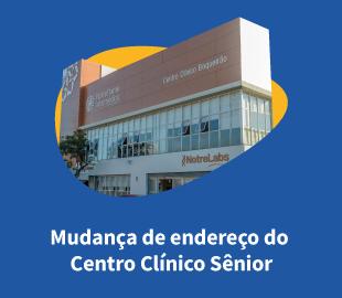 Fachada do Centro Clínico Boqueirão, com uma sobreposição azul e amarela e a frase Mudança de endereço do Centro Clínico Sênior, simbolizando a alteração de endereço da unidade.